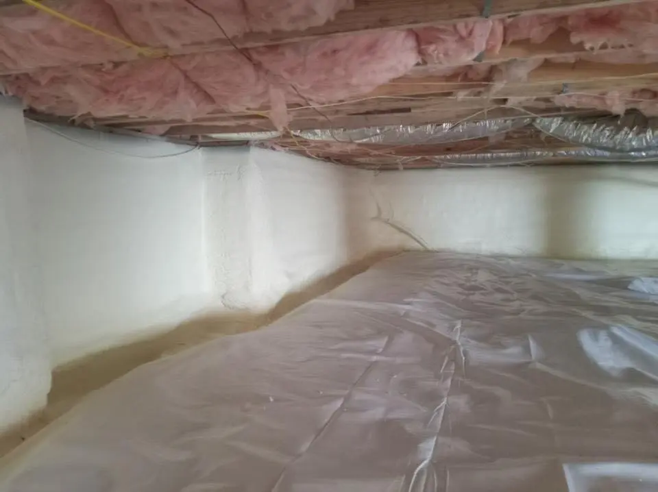 Crawl space encapsulation with closed-cell spray foam for Commercial Roof Restoration in Westwood